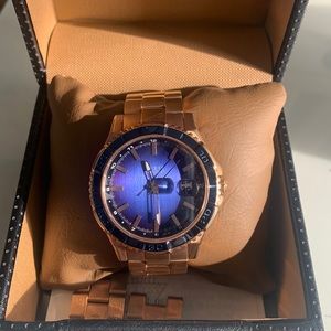 Rose gold Guess watch with blue watch face - batteries NOT included